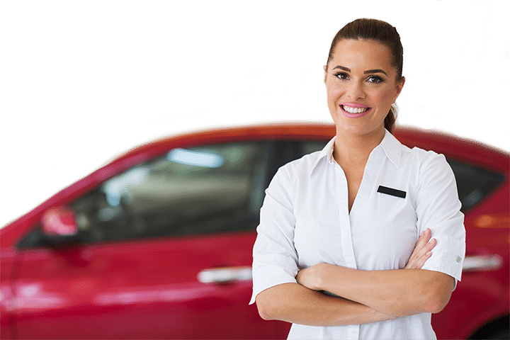 Woman with crossed arms standing in front of a red car